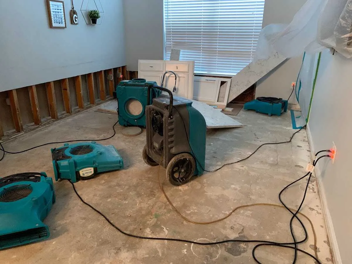 Dehumidifier in flood-cut room for Water Damage Restoration in Fort Carson